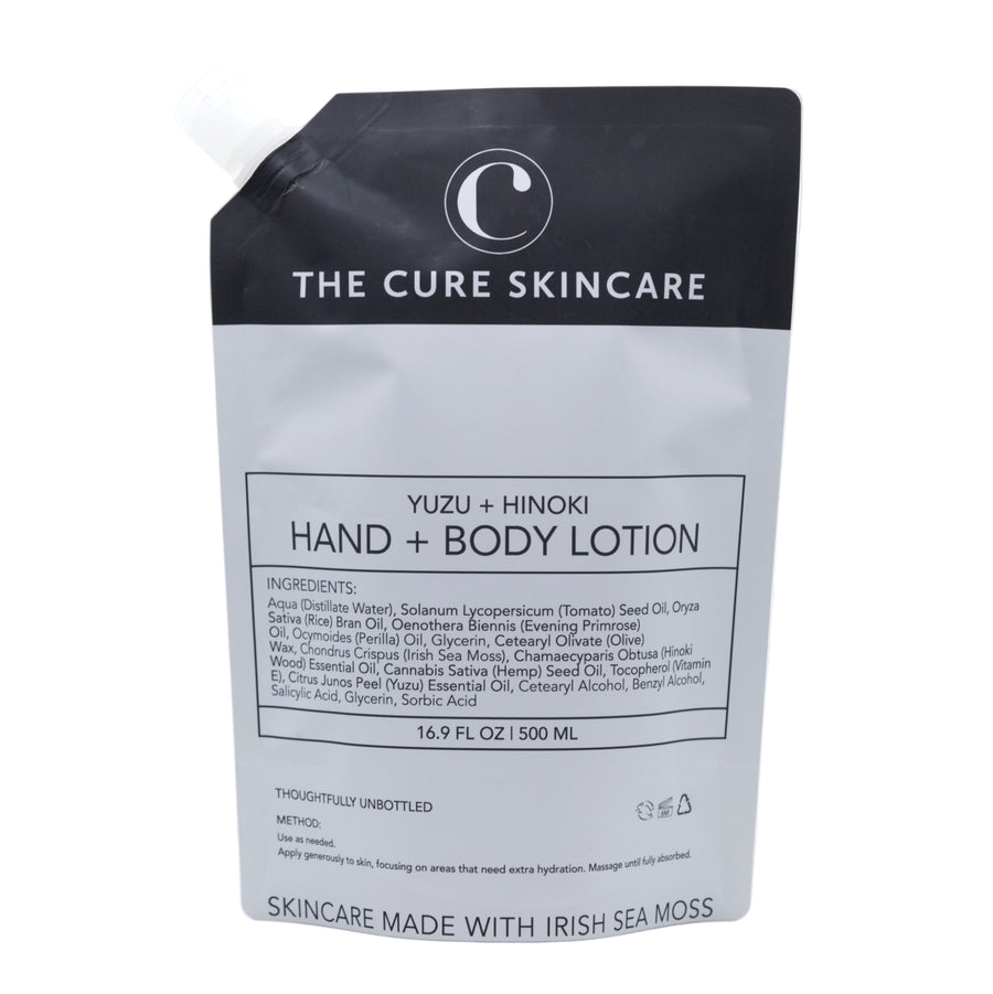 The Cure Skincare Yuzu + Hinoki Hand & Body Lotion packaging on a white background