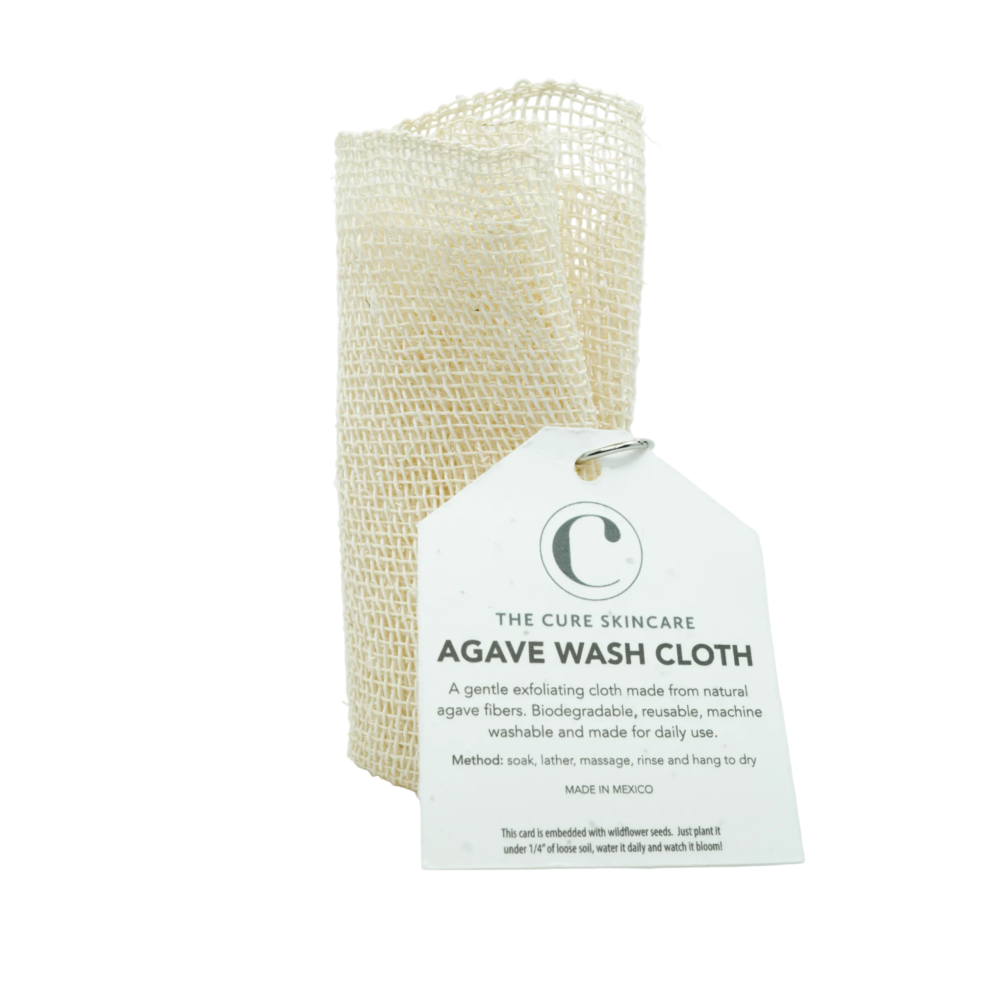 Agave wash cloth with packaging on a light gray background